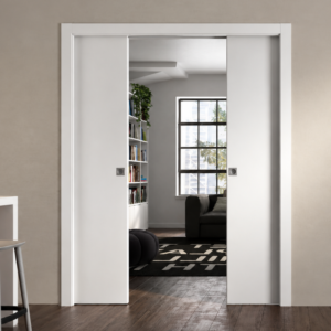 Système pour porte coulissante à galandage double vantaux