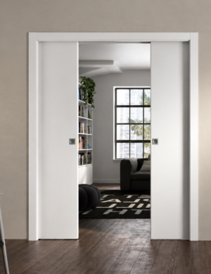 Système pour porte coulissante à galandage double vantaux